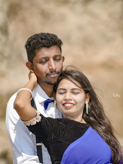 A close-up, intimate moment between a couple, with the beautiful natural scenery of the quarry in the background.
