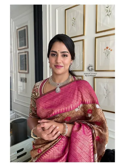 A close up of Revathi's makeup. The look is clean, classic, and sophisticated, showcasing my ability to create understated yet impactful makeup for high profile clients.