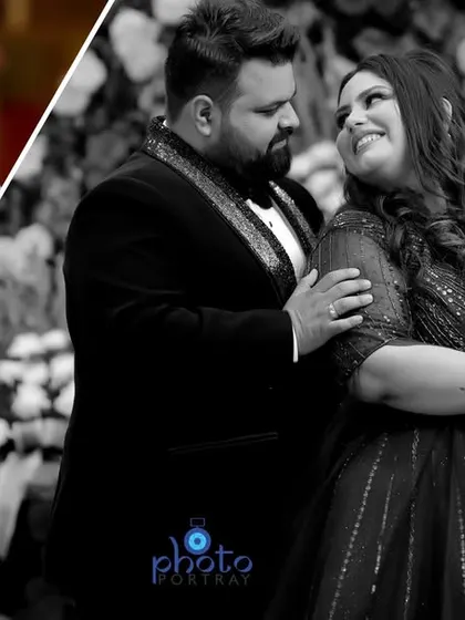 A black and white album layout that beautifully contrasts a candid couple moment with a solo portrait of the bride.