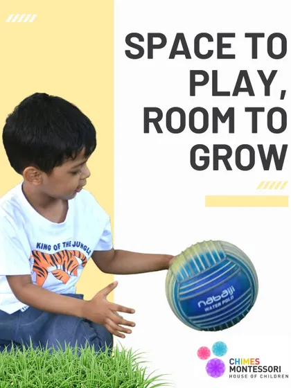 We provide the space to play and the room to grow. A child holds a ball, ready for a game in our safe and engaging outdoor area.