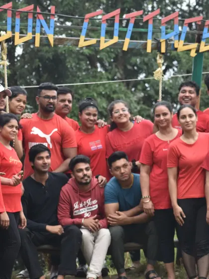 A group photo from our yoga retreat at Moon Cottages. We are more than a class; we are a family.