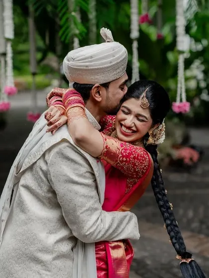 A candid moment of pure laughter and joy. We love capturing the uninhibited happiness of our couples, creating photos that are full of life and energy.