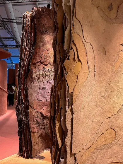 Layers of treated surfaces articulate the story of 'Soil'. This view shows different material interpretations, from rough bark-like textures to smoother, layered earth, hinting at the geological narratives embedded within.