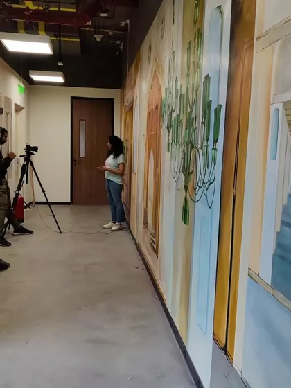 A behind-the-scenes shot from the filming at the Microsoft office, where I discussed the mural project.