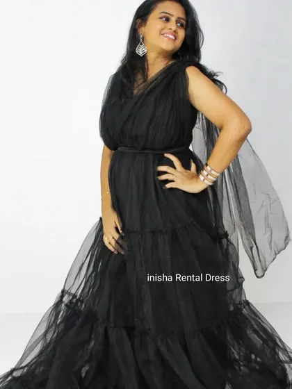 A lovely pose in the black tiered tulle gown, showing its flattering silhouette and soft fabric. It's a great option for post-maternity shoots too.
