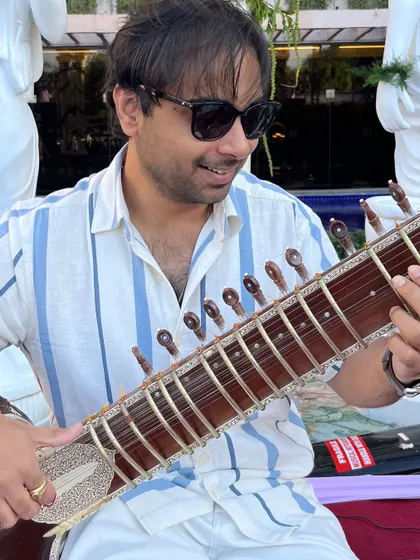A casual shot of me playing outdoors. I find inspiration in different environments, and sometimes the best music happens away from the stage.