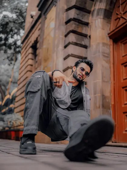 A dynamic low-angle shot that makes the model look powerful and larger than life. This is a great technique for men's fashion.