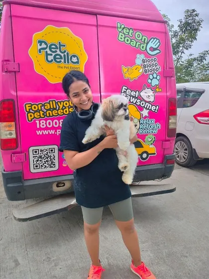 A happy pet parent with her freshly groomed rockstar! Meeting adorable pets and seeing them look their best is the biggest reward for our team.