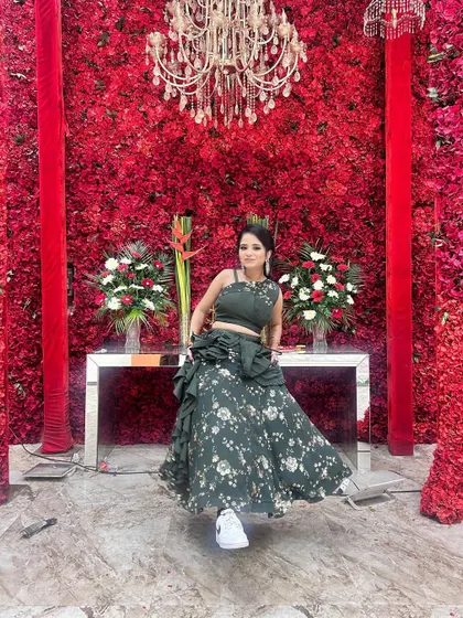 Comfort is key. Our client pairs her festive lehenga with sneakers, proving that you can be stylish and comfortable at the same time.