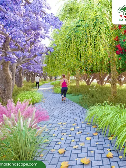 A rendering of a park with a paved jogging path lined with a vibrant mix of flowering and weeping trees. This design promotes an active lifestyle while immersing users in a beautiful, colorful, and naturalistic setting.