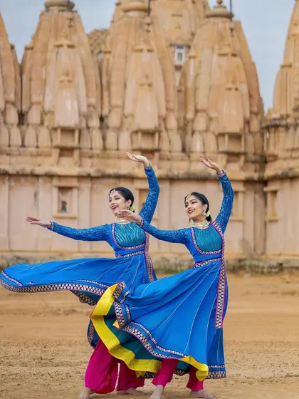 A duplicate of image 69, showing a happy, synchronized pose.