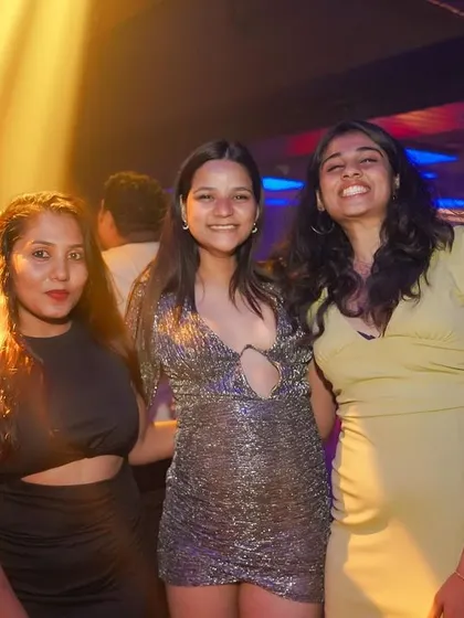 The lighting and music create a perfect atmosphere for a night of dancing.