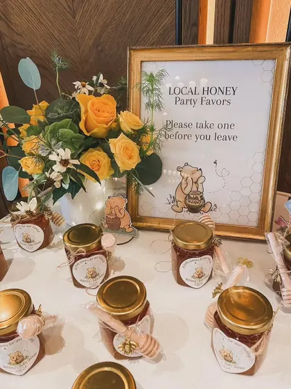 "Local Honey" party favors for a bee-themed event. I can help curate and style every detail, including thoughtful and on-theme return gifts.