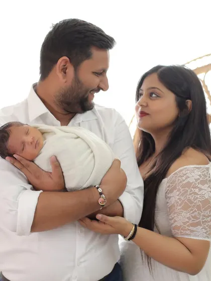 Your first family portrait. In the midst of all the changes, we pause to capture the three of you together, creating a memory of where your new chapter as a family began.