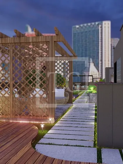A view of the Mumbai project's layout, showcasing the wooden deck, pathways, and the placement of the pergola, demonstrating a thoughtful approach to landscape planning.