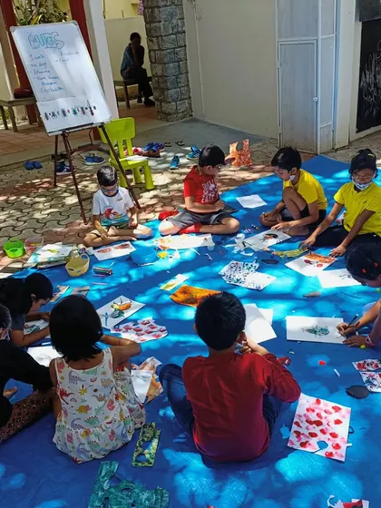 A wide shot of our "Bugs" workshop in full swing. The kids are busy creating their own bug collages after learning all about insects and their amazing adaptations.