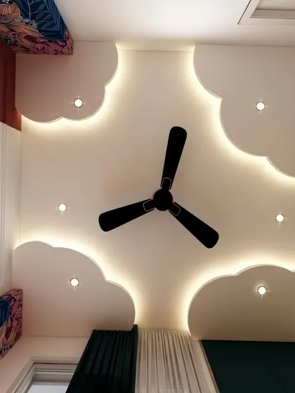 A creative false ceiling design in the shape of clouds with backlighting. This whimsical touch is perfect for a child's room, adding a sense of wonder and fun to the space.