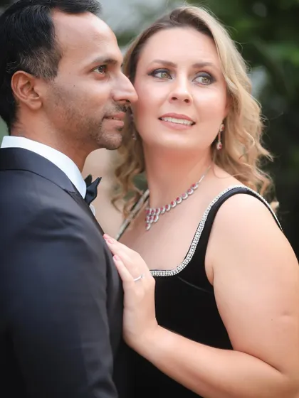A beautifully composed colour portrait from a pre-wedding shoot. The couple's pose is classic and elegant, and the natural lighting perfectly illuminates their features.