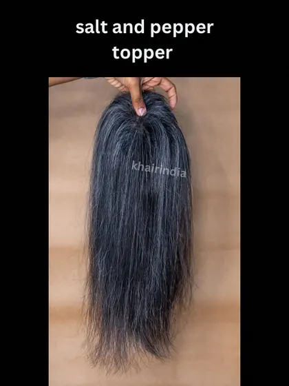 Embrace your natural color with our salt and pepper topper. This piece is a 4/5 lace base, offering a lightweight feel and a realistic blend for those with graying hair.