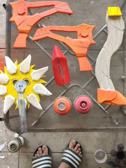 The different parts of the Krieg Buzz-axe laid out before assembly. Each piece was individually crafted and painted to achieve that signature Borderlands cell-shaded look.