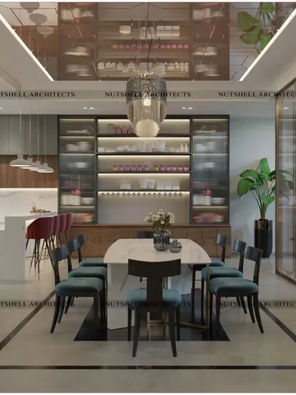 This design connects an open kitchen with the dining area, perfect for modern family living. A large island provides extra counter space, while the mirrored ceiling above the dining table adds a sense of luxury and spaciousness.