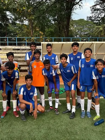 Our U15 football team poses together after being placed at the top of the table in the DPDL tournament, a result of their consistent performance.