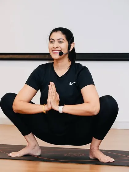 Grounded in Malasana (Garland Pose) while leading a corporate yoga session. Sharing this practice with so many beautiful souls is always a blissful experience.