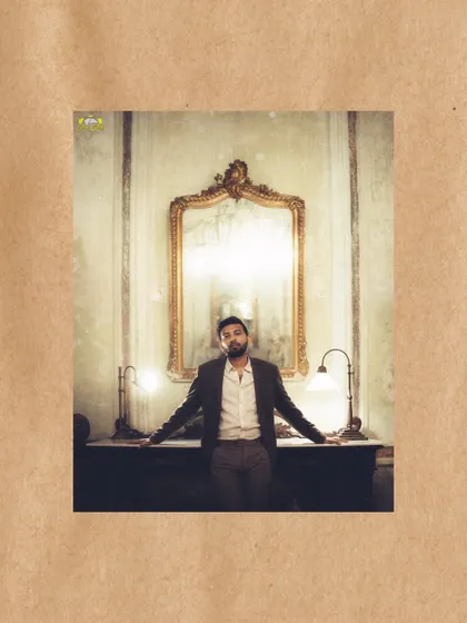 A solo portrait of the groom in the same vintage Pondicherry setting, exuding confidence and classic style.