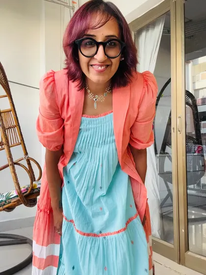 A happy, smiling shot in my layered dress look. I love combining different pieces to create something new.
