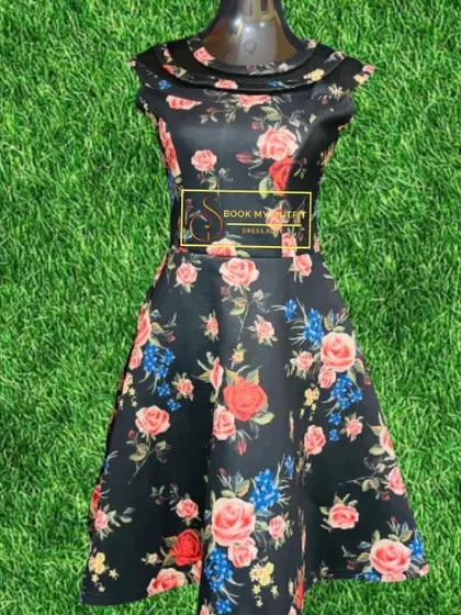 Displayed on a mannequin, this black floral dress shows off its flattering A-line shape and cap sleeves. The vibrant floral pattern stands out beautifully against the dark background.