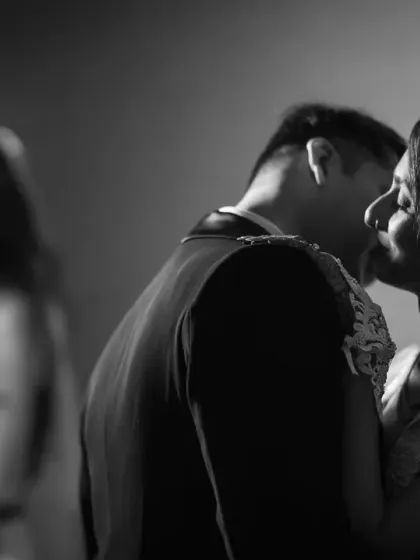 There's something timeless and romantic about a black and white photo. This shot, inspired by classic 1940s films, uses reflections and shadows to create a moody and intimate couple portrait during a monsoon wedding.