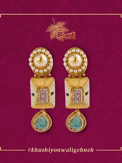 Adorn yourself with the exquisite beauty of these earrings, featuring square-shaped motifs with delicate diamond work and intricate pastel meena detailing. The turquoise drops add a final touch of color and elegance.