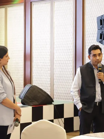 Listening intently as a Cipla team member shares his thoughts. Active listening is a crucial part of my role as a host.