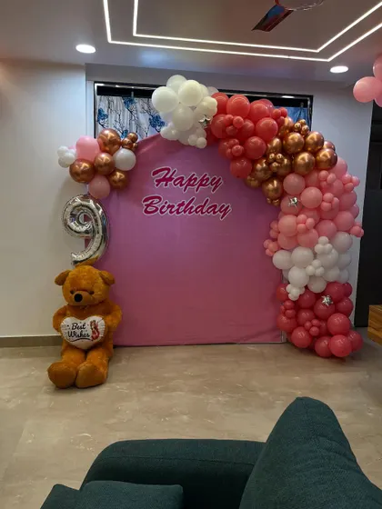 A slightly different angle of the birthday setup, showing how it fits perfectly in a home living room.