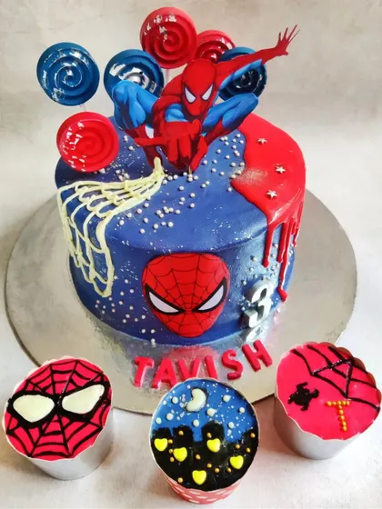 This custom Spiderman cake and matching cupcakes were a dream to create for a little hero's third birthday. I love bringing your favourite characters to life with vibrant, 100% eggless pineapple cake and white chocolate ganache.