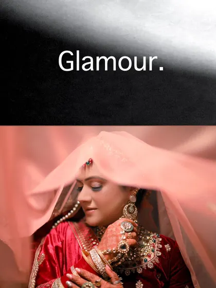 A glamorous shot of Kashika, her pink veil flowing, capturing the movement and beauty of her bridal look.