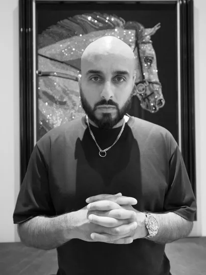 A black and white portrait. Sometimes stripping away the color lets the focus and intensity shine through.