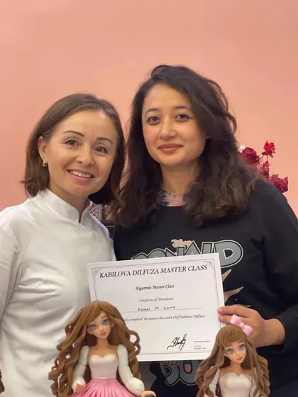 I'm always trying to learn new skills. Here I am receiving my certificate after completing a master class on sculpting realistic figurines with the amazing Chef Kabilova Dilfuza.