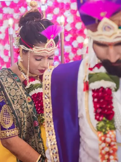 A solemn and beautiful moment as the couple stands together during a wedding ritual.