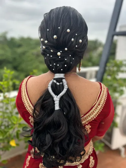 The full view of the heart-design ponytail, a truly unique style created in one of my classes.