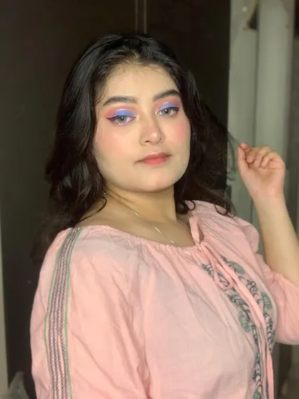 A full view of the pink and purple pastel look.