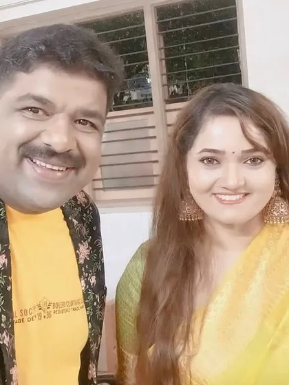 With a fellow artist during the musical night at the Dharmasthala Lakshadeeepotsava. The festival attracts thousands of devotees.