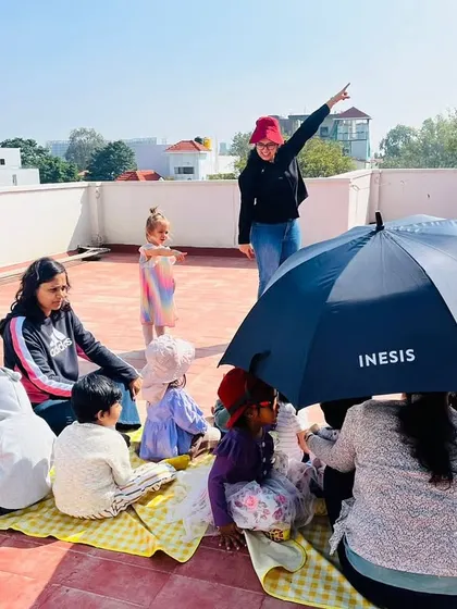On a sunny day, we took our lesson about seasons to the rooftop. The children experienced the warmth of the winter sun firsthand while we discussed how seasons change and what we wear.