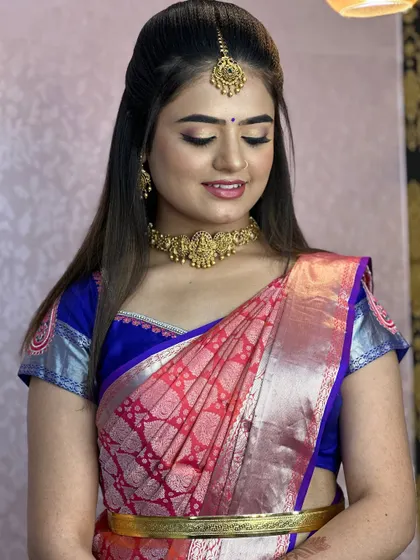 More examples of clean and elegant hairstyles and draping for pre-wedding functions, ensuring the bride looks polished and ready for photos.