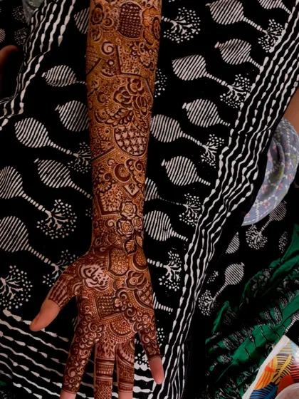 The full arm view of bride Noora's bridal mehndi. The design is a testament to patience and precision, resulting in a stunning piece of wearable art.