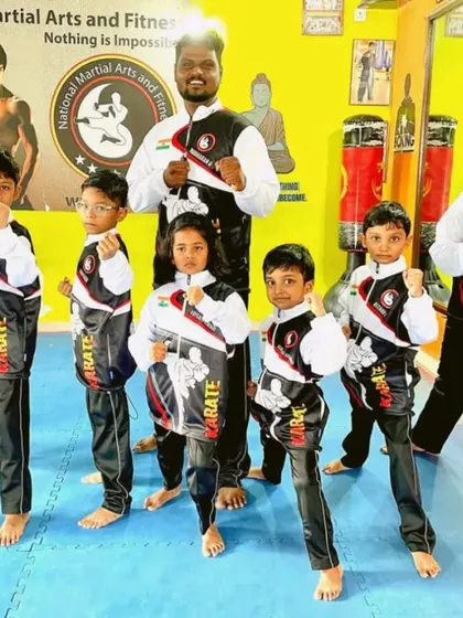Team NMFA in a ready stance. We compete to better ourselves and support each other along the way.