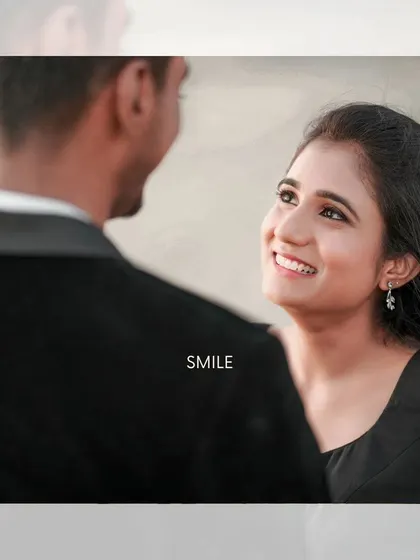 A close-up shot focusing on the bride's radiant smile as she looks at her partner during their Kerala pre-wedding shoot.