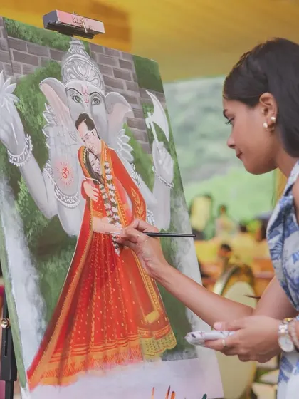 A unique and personal touch: a live artist painting the couple's wedding portrait during the ceremony, creating a timeless piece of art.