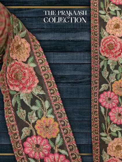A close-up of a wide, floral designer lace featuring multi-colored threadwork embroidery. This type of intricate border is perfect for adding a luxurious finish to bridal lehengas, dupattas, and ethnic gowns.