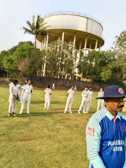 A coach observing the girls during the selection trials. We are always on the lookout for that special spark.